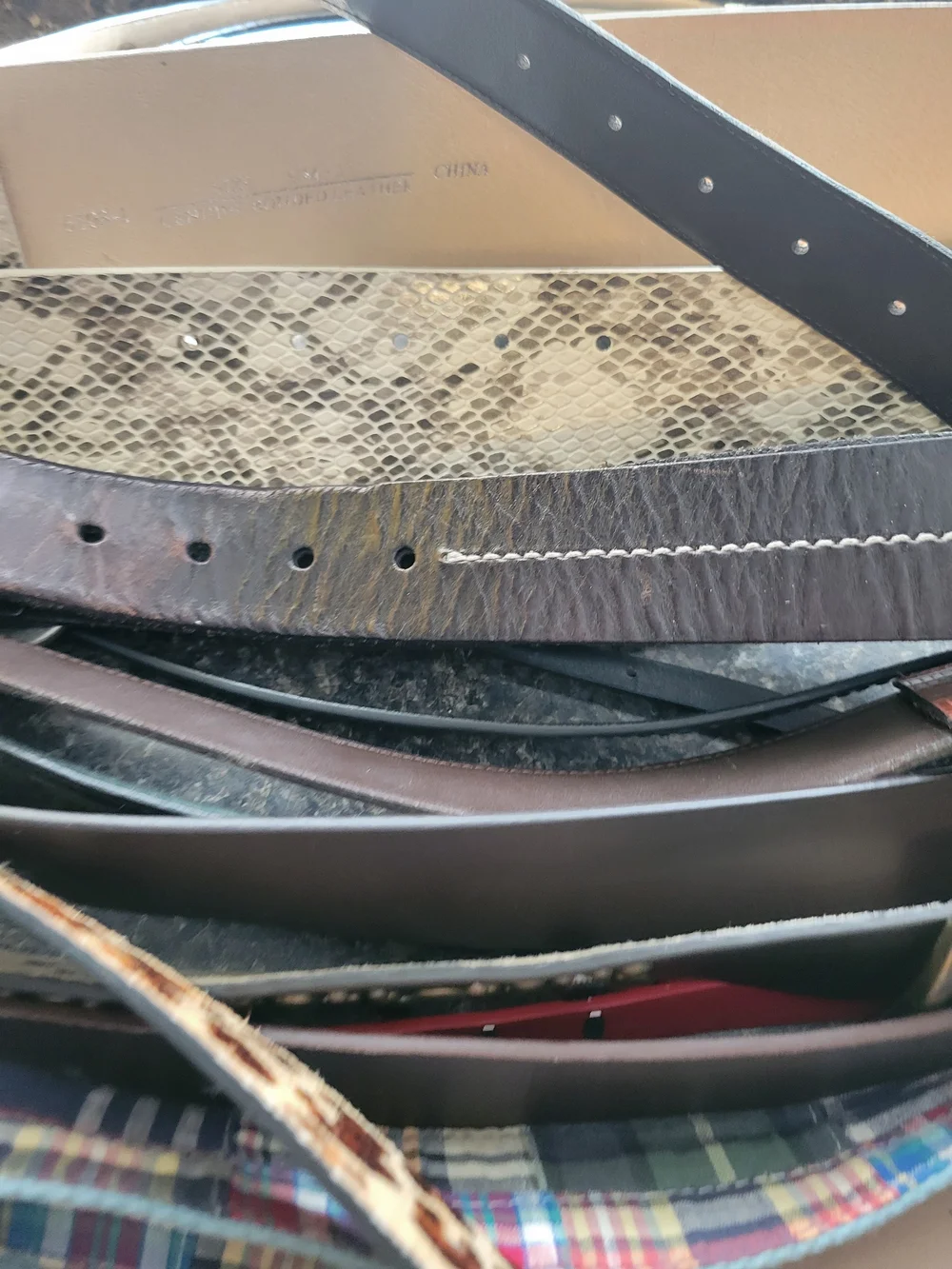 Lot of 18 belts from various brands with Pink, Black, Brown and prints